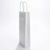 Sac kraft 1 bouteille à poignées torsadées 140 x 390 x 80 mm blanc